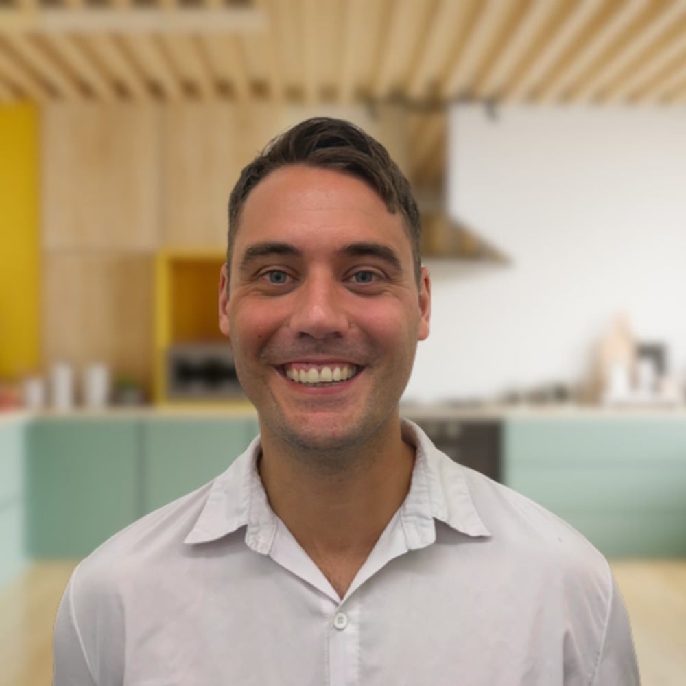 James Hart, Dietitian at Conscious Healthcare SA, smiling in a bright kitchen